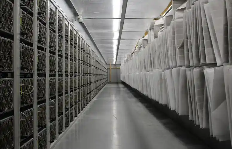 Vast Bitcoin mining farm filled with multiple rows of mining machines